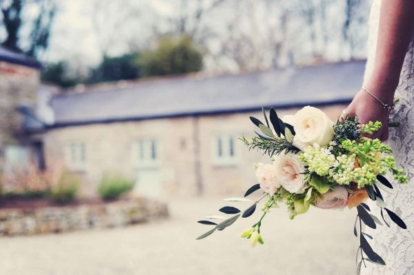 A photograph of a wedding venue Cosawes Barton a beautiful English Country wedding venue. A secret garden wedding venue