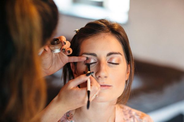 Bride to be having wedding makeup applied by a professional makeup artsist from Hands and Tans as featured on eeek!