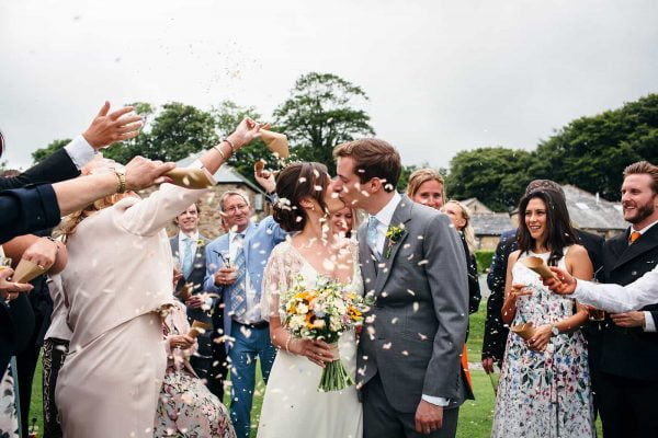 Newly weds and confetti by Freckle Photography