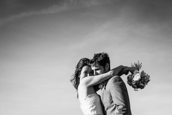 Newly weds holiding one abother by Polly Stock Photography