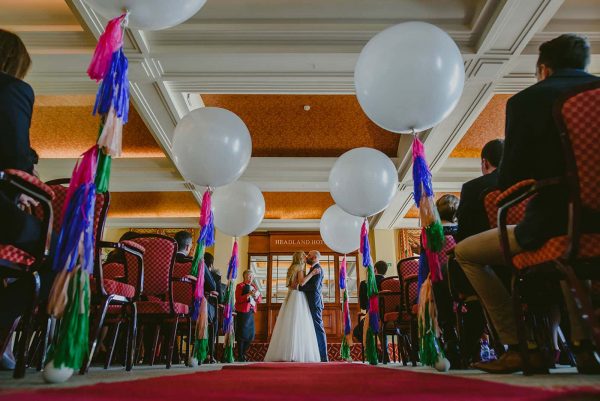 photograph of couple kissing and balloons by Snazzy Balloons on eeek! weddings