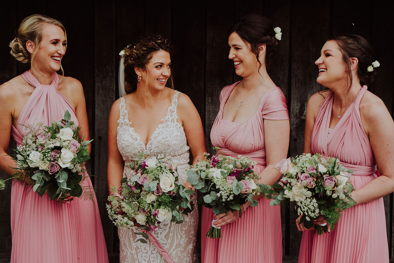  Bridesmaids in pink wedding dresses all of different styles - Get Married in Cornwall with eeek!